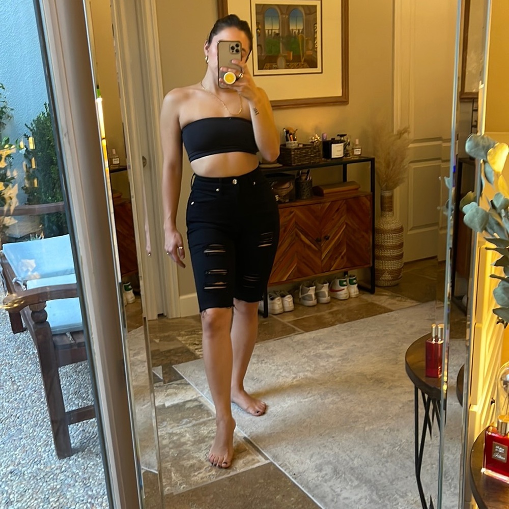 Good American black ripped Bermuda shorts